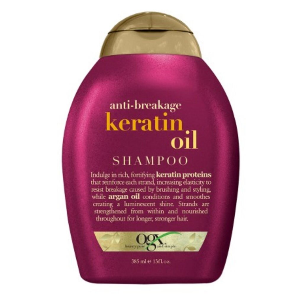 OGX SHAMPOO ANTIQUIEBRE CON ACEITE DE QUERATINA 13 OZ
